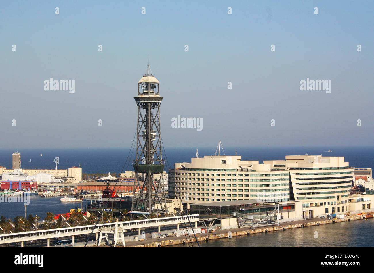 Cable car tower and buildings in Barcelona city, Spain Stock Photo - Alamy