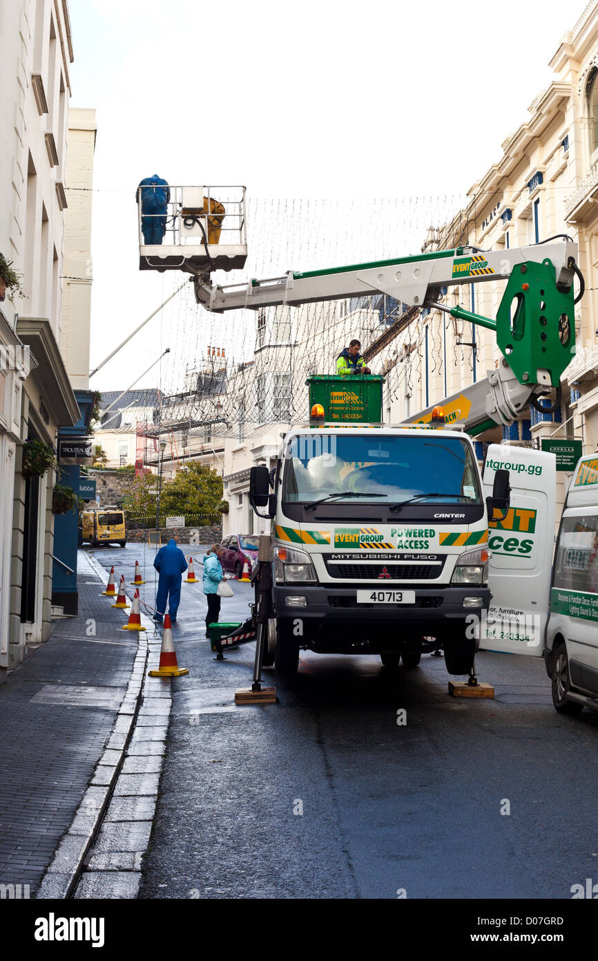 Putting up christmas lights in Guernsey, 4th November 2012 Stock Photo