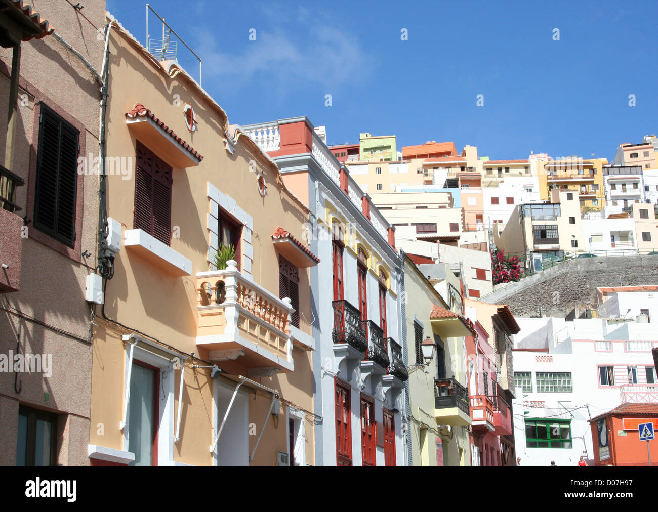 Colourful buildings against blue sky in Old town La Gomera san Sebastian Canary islands Spain Stock Photo