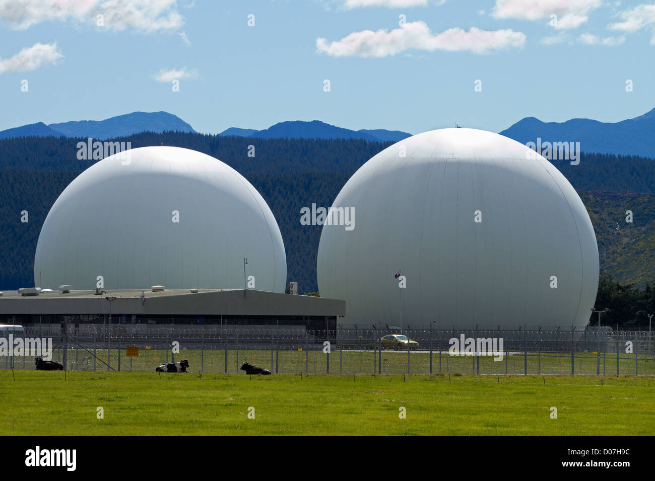 Domes covering satellite dishes, Waihopai Spy Base, and farmland, Waihopai Valley, near Blenheim, Marlborough, new Zealand Stock Photo