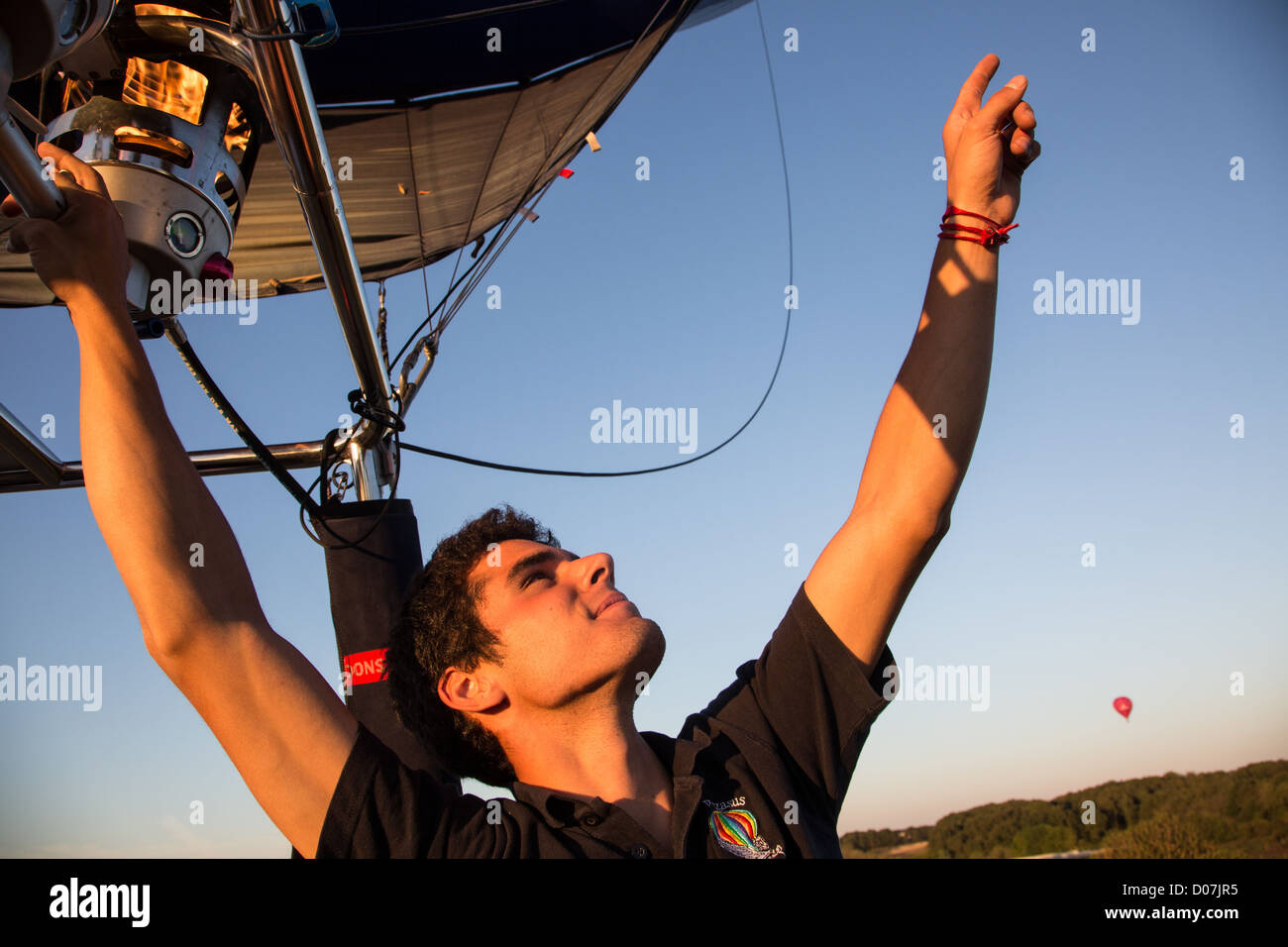PILOT IN A HOT-AIR BALLOON FLYING OVER THE EURE VALLEY EURE-ET-LOIR (28) FRANCE Stock Photo