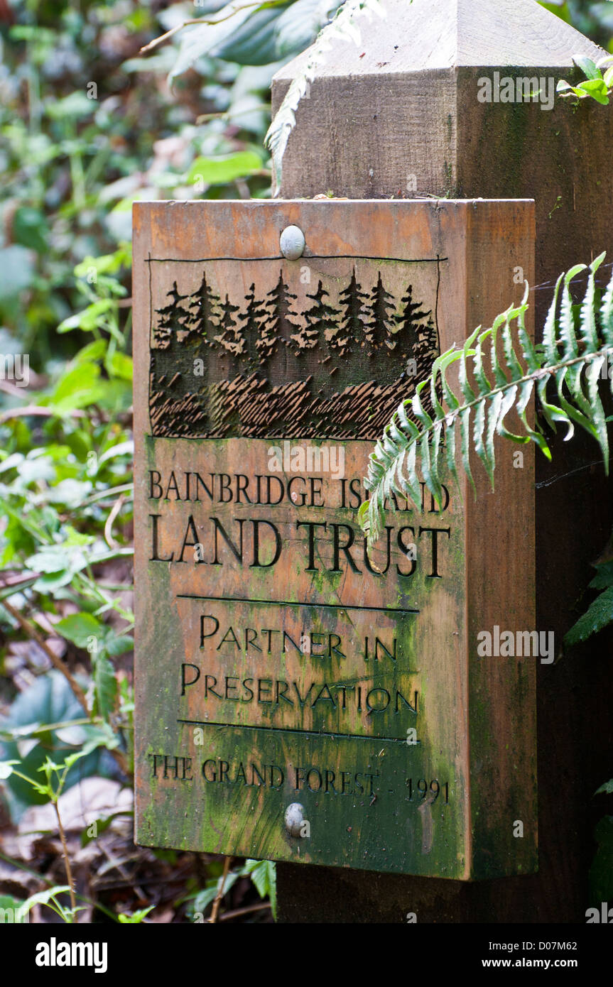 USA, WA, Bainbridge Island. Trailhead carved sign Grand Forest