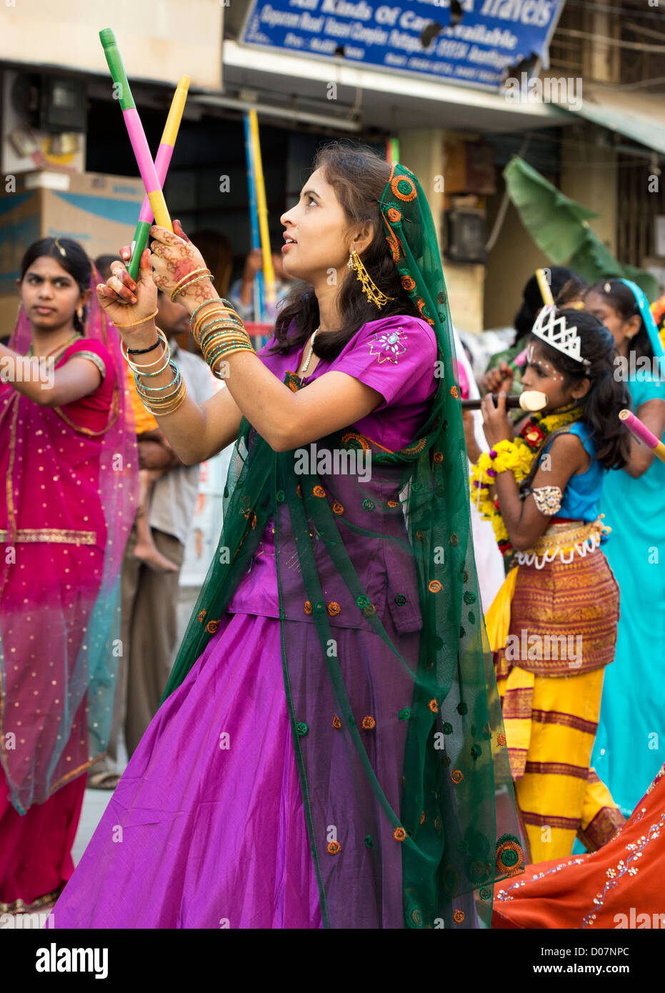 Indian girls in traditional dress dancing at a festival in the streets of  Puttaparthi. Andhra Pradesh, India Stock Photo - Alamy