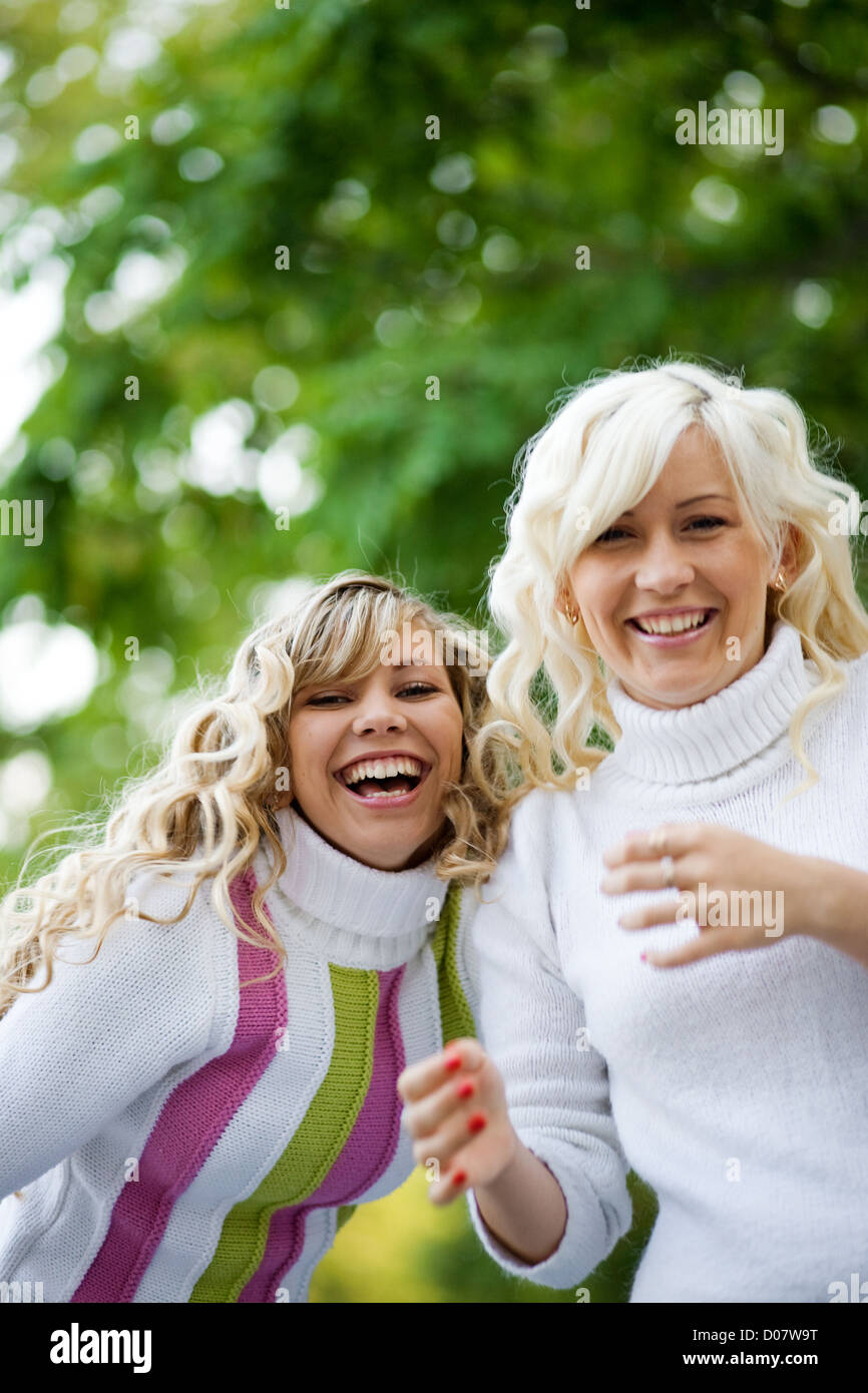 Photo of two teenage girls smiling Stock Photo - Alamy