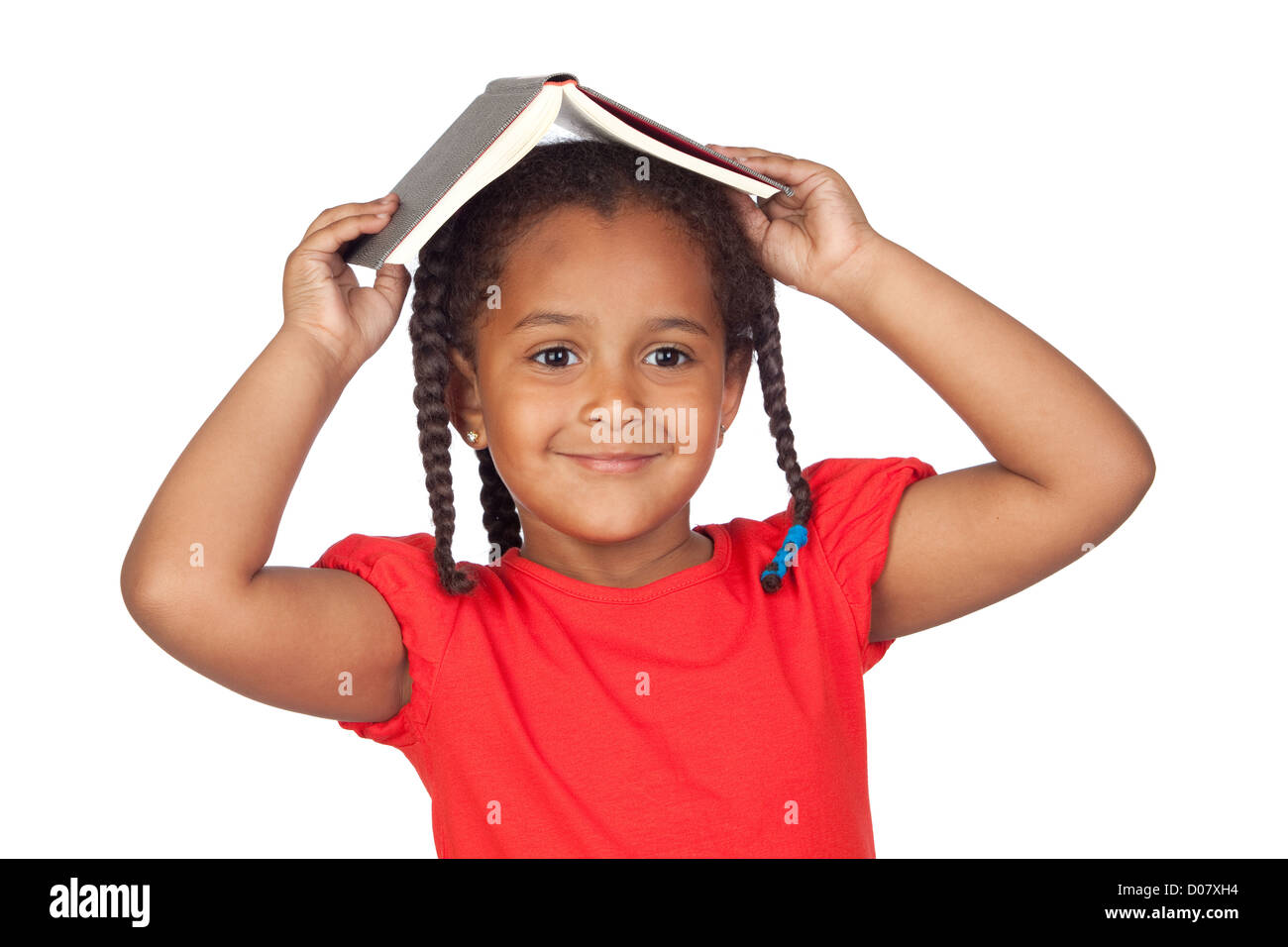 African little girl reading a book isolated on a over white Stock Photo ...