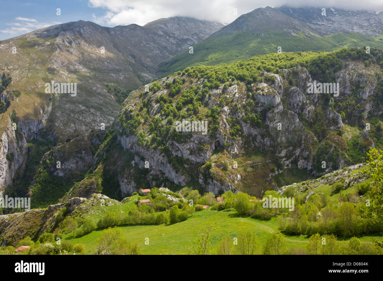 High pastures and barns (invernales) near Tresviso in the limestone Picos de Europa, Spain. Stock Photo
