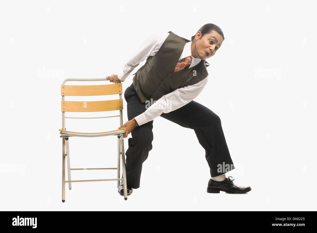 Pulling out chair hires stock photography and images Alamy