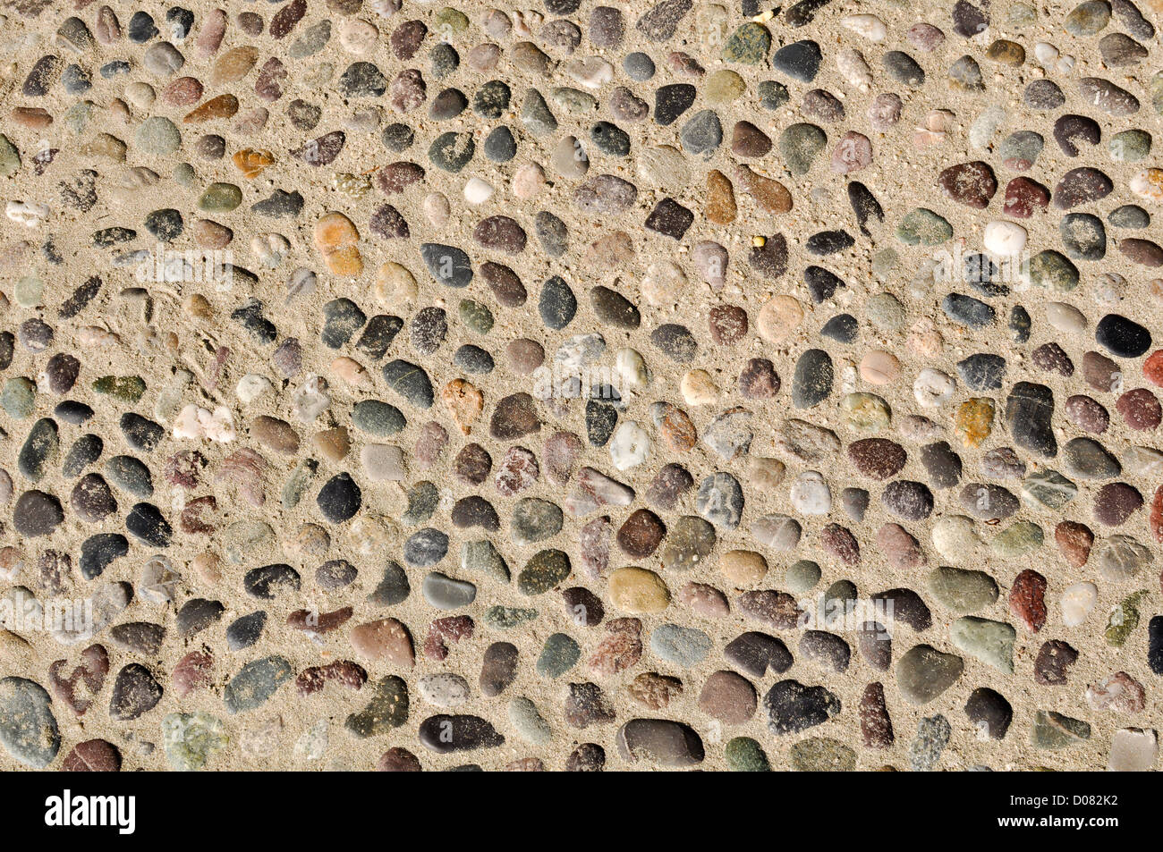 Colorful Rocks and Stones in Sand Background Stock Photo - Alamy