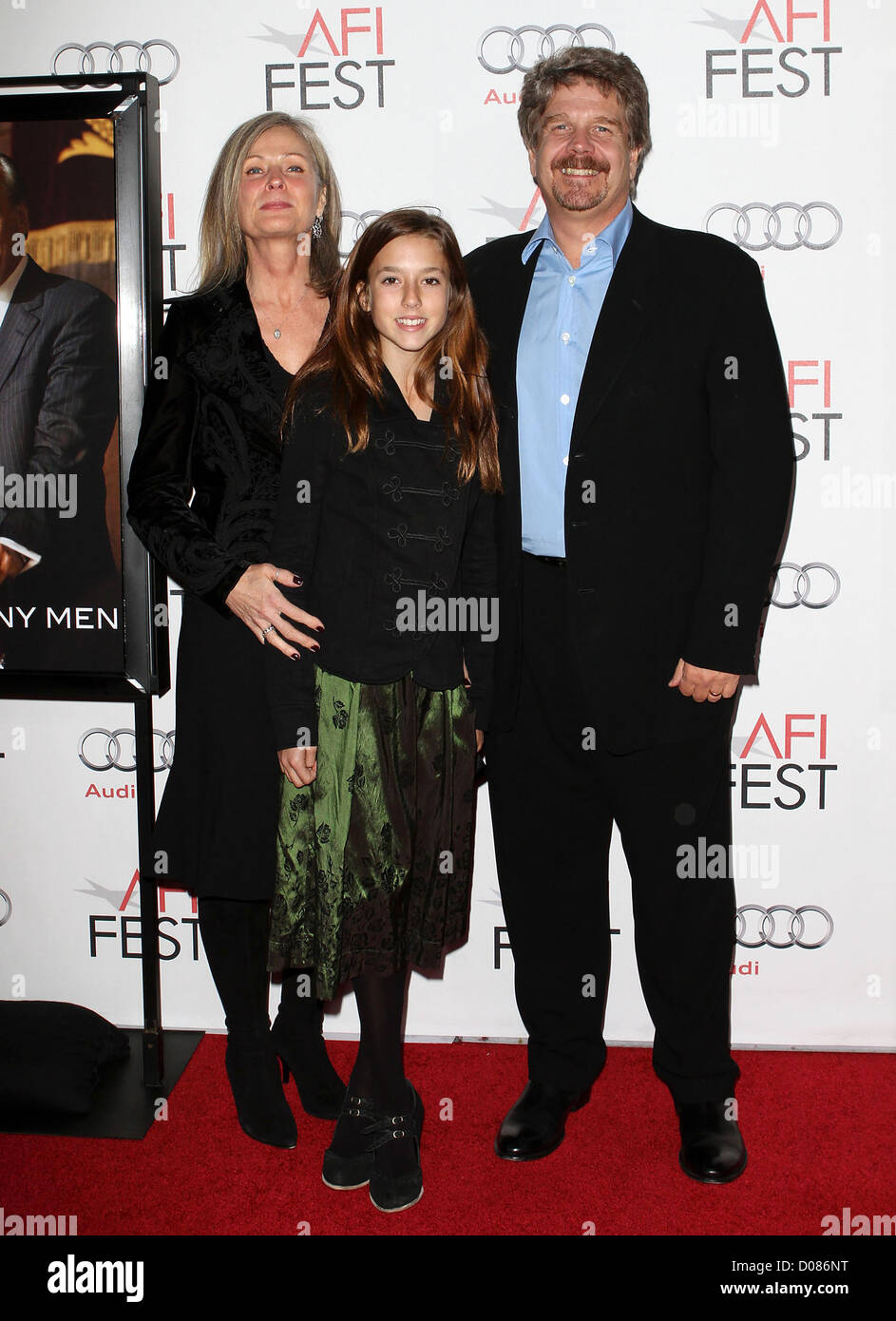 John Wells with his wife Marilyn Wells and daughter Madison Wells AFI Fest 2010 - 'The Company Men' screening held at Grauman's Stock Photo