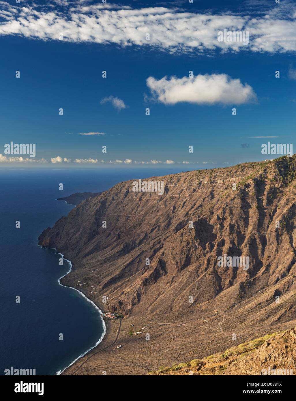 View from the cliff-top Mirador de Isora, El Hierro, Canary Islands, Spain. The largest building visible is the Parador Hotel Stock Photo