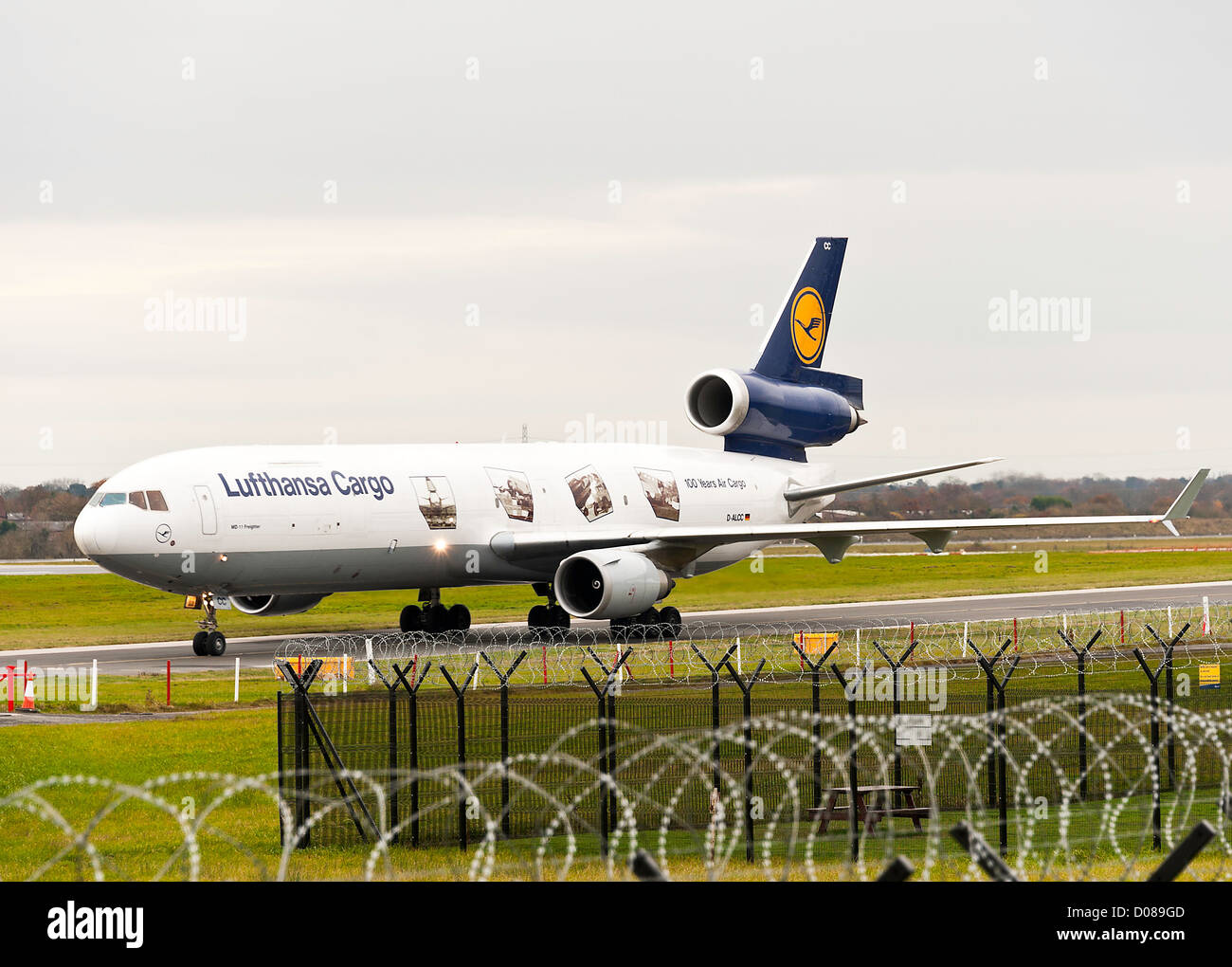 Lufthansa Cargo Airlines Mc Donnell Douglas MD-11F Freighter Airliner D-ALCC Taxiing at Manchester Airport England UK Stock Photo