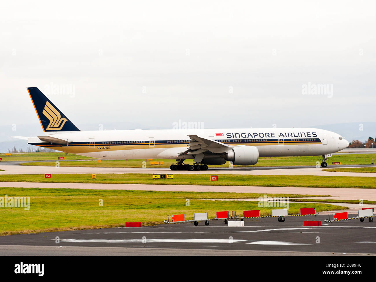 Singapore Airlines Boeing 777-312ER Airliner 9V-SWS Taxiing for Departure at Manchester Airport England United Kingdom UK Stock Photo