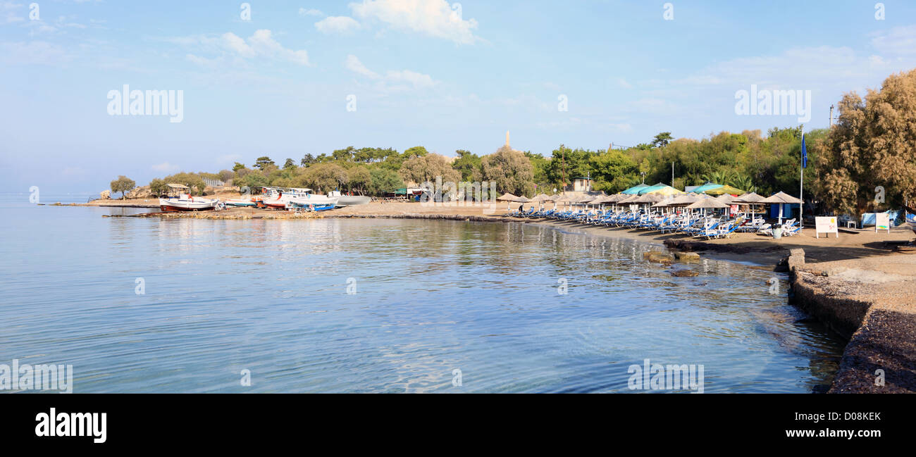 Aegina Town beach beside the small-boat repair area and in the shadow of the ruins of ancient Aegina and the temple of Apollo Stock Photo