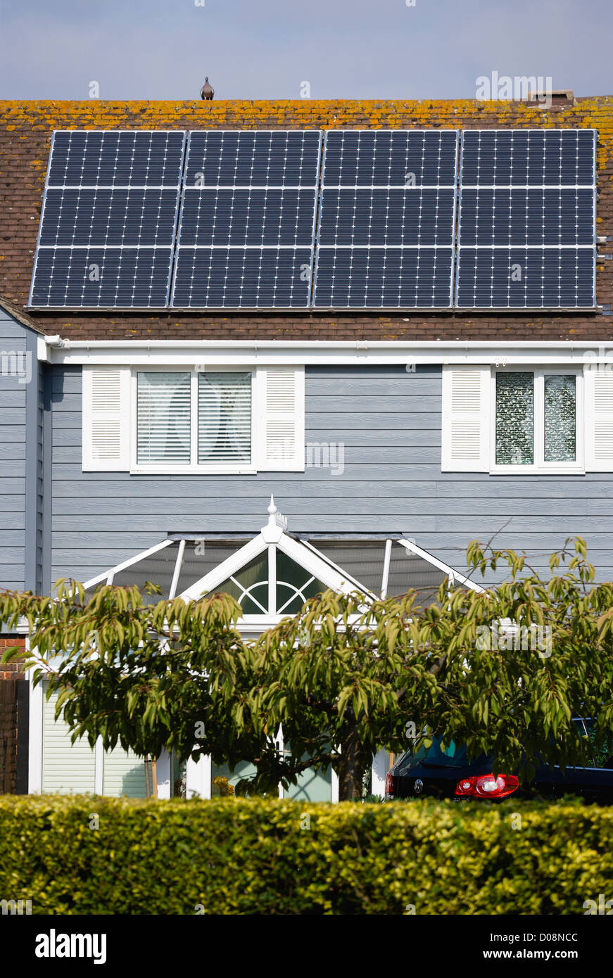 Architecture, Alternative Energy, Electricity, Solar photovoltaic roof panels on detached house