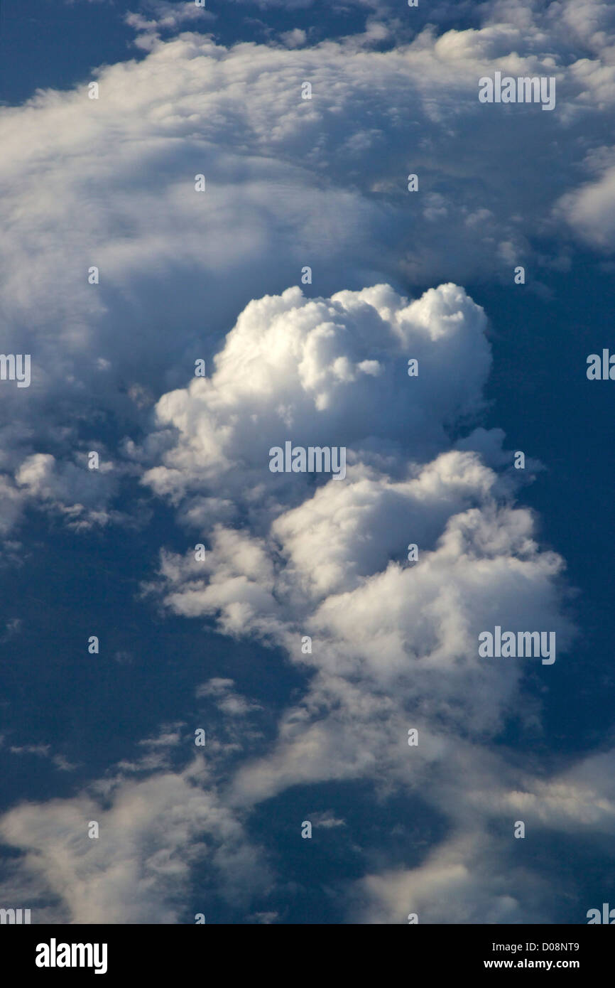 Aerial view of clouds from passenger jet at 30,000 feet Stock Photo