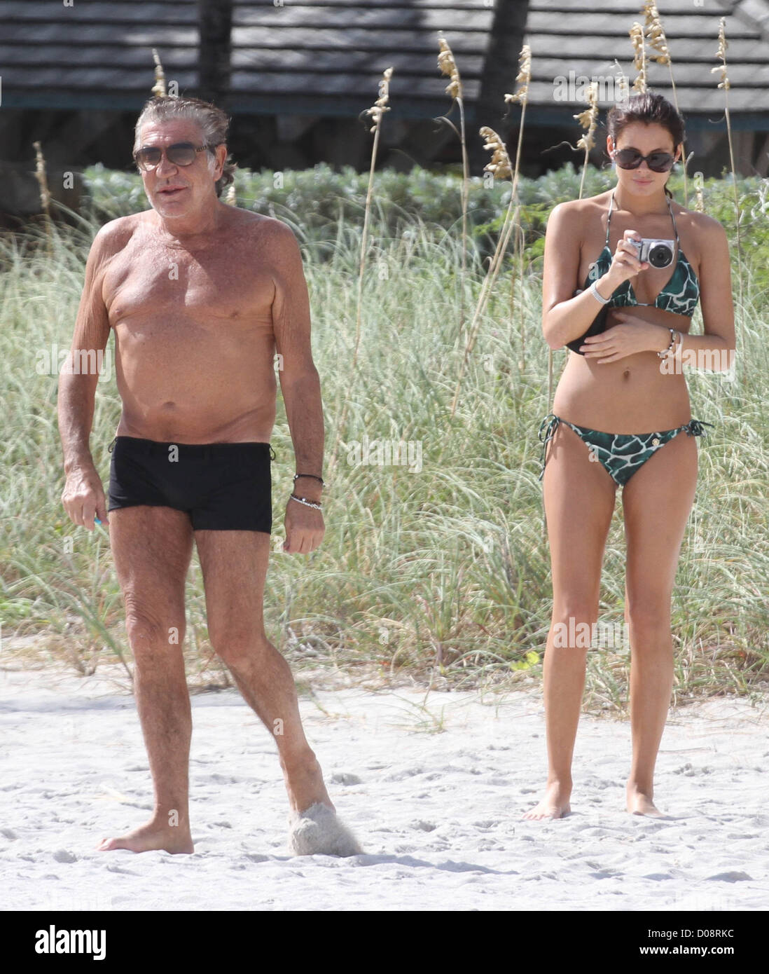 Roberto Cavalli enjoying the sunshine while on holiday with a friend on  Miami beach Miami, USA - 19.11.10for Stock Photo - Alamy