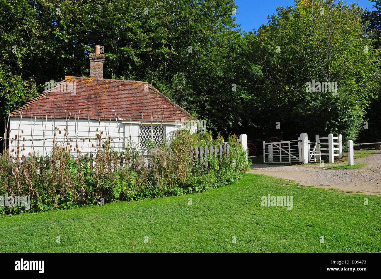 The Toll House, the toll gate and a kissing gate. Weald And Downland Open Air Museum Stock Photo