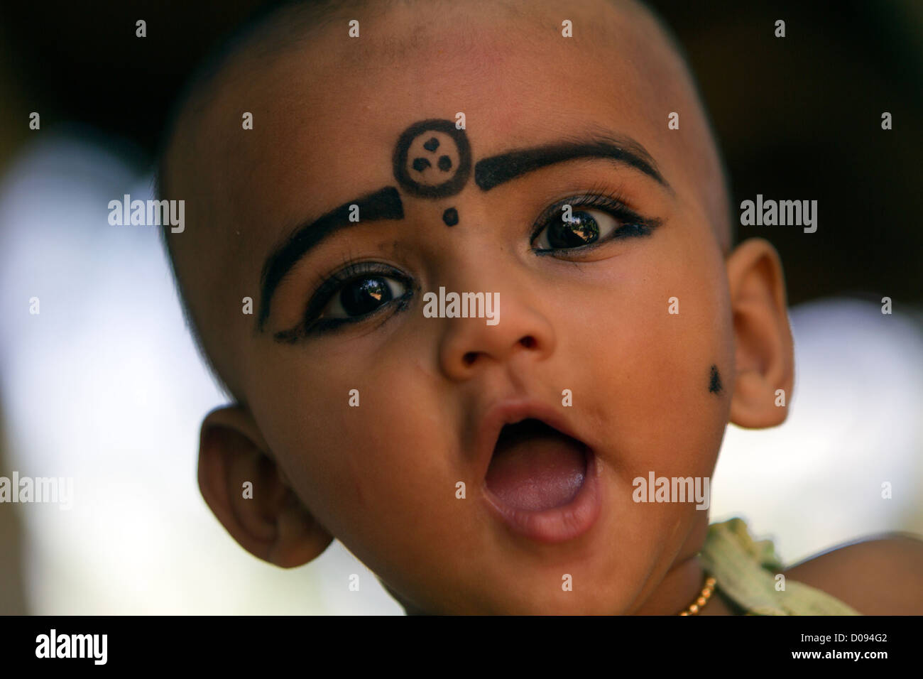 A Child Wearing Kajal Make Up A Natural Black Coloured Balm Both Stock Photo Alamy