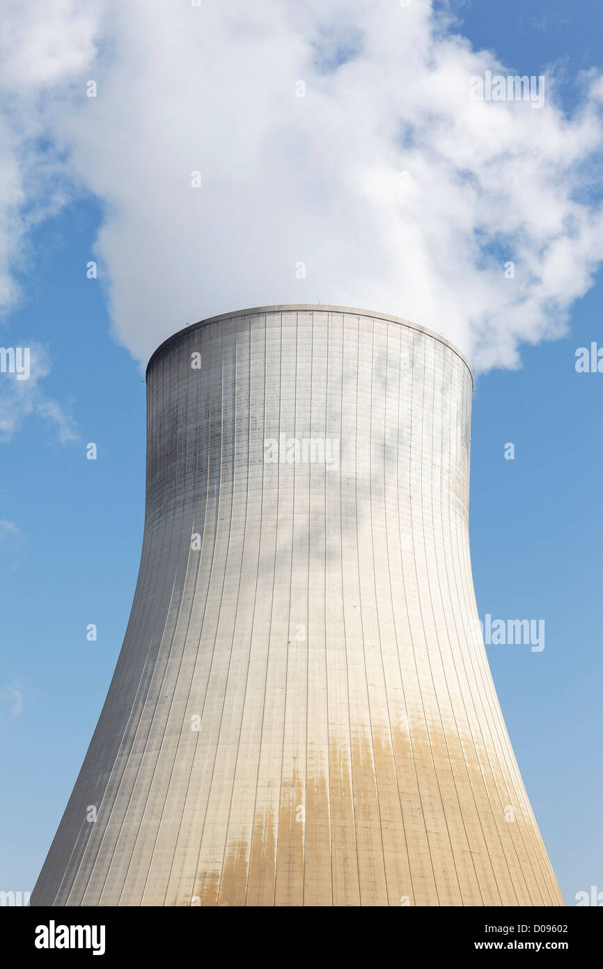 big smokestack of nuclear factory with blue sky Stock Photo