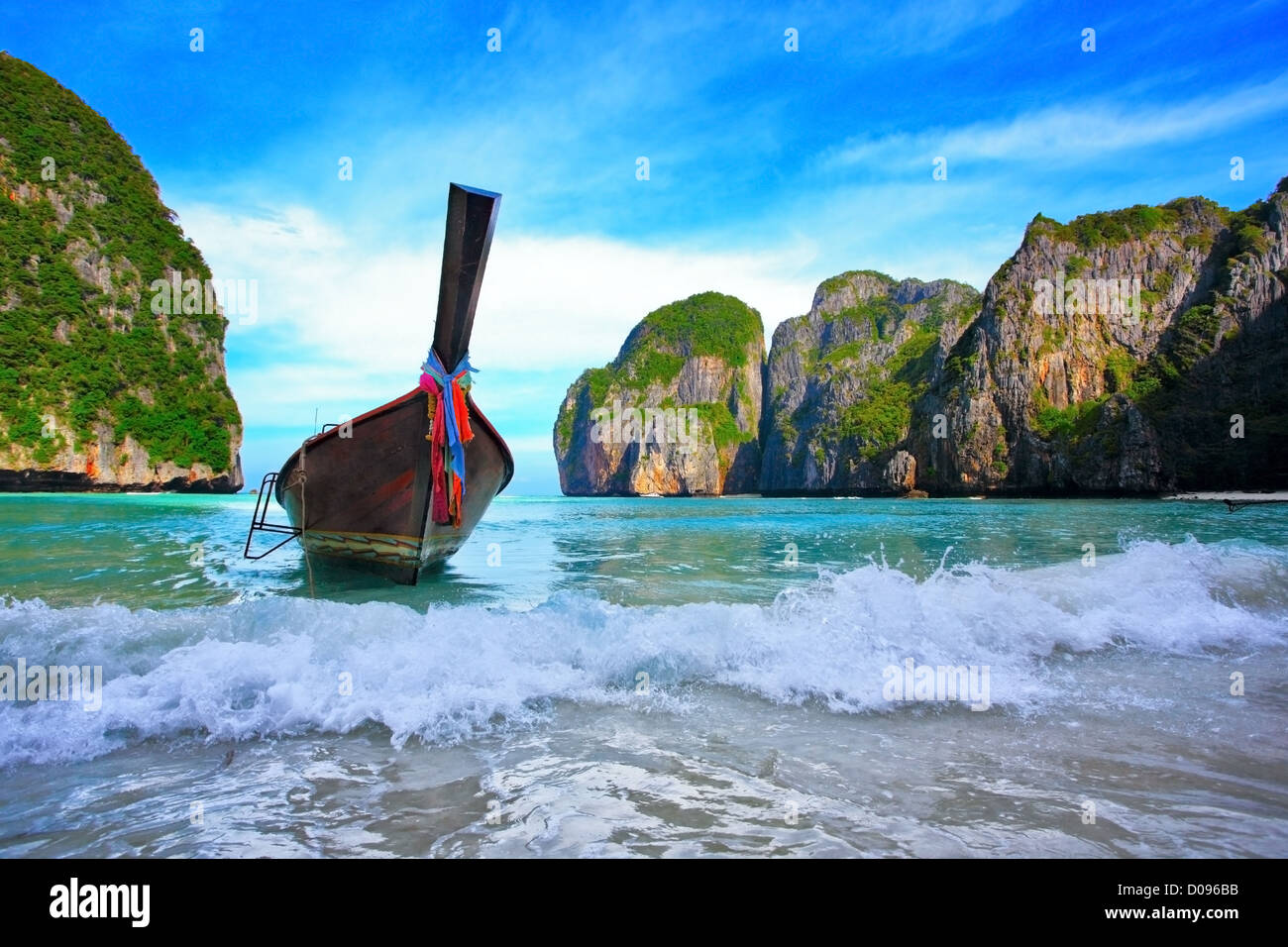 Long tail boats in Maya Bay, Koh Phi Phi Ley, Thailand. The place where the movie the Beach was filmed Stock Photo