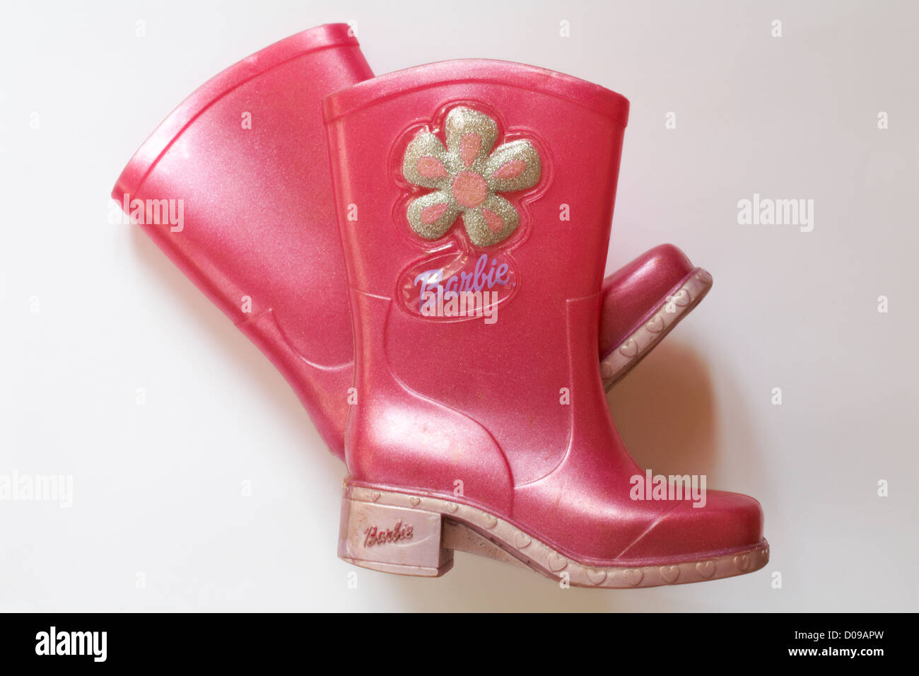 Pair of girl's pink Barbie wellington boots isolated on white background  Stock Photo - Alamy
