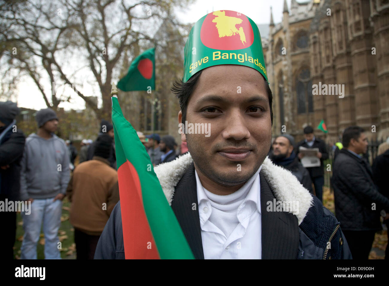 20th November 2012. London UK. A Bangladeshi Protester in front of the Houses of Parliament in Westminster against the imprisonment of leaders of opposition parties by the Bangladeshi Government Stock Photo