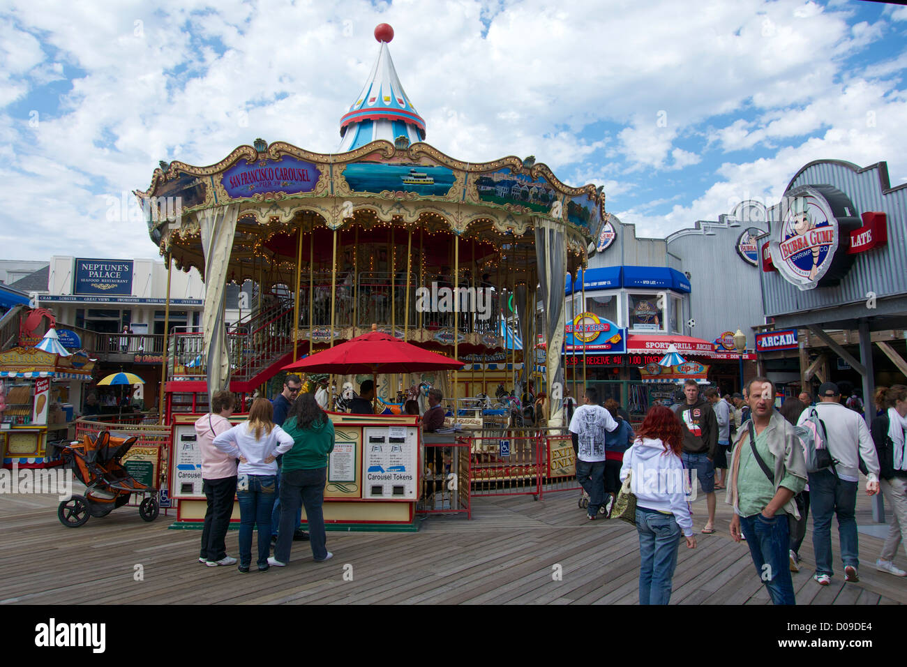 Tourists on Fisherman`s Wharf, Pier 39 at Carousel Editorial Stock