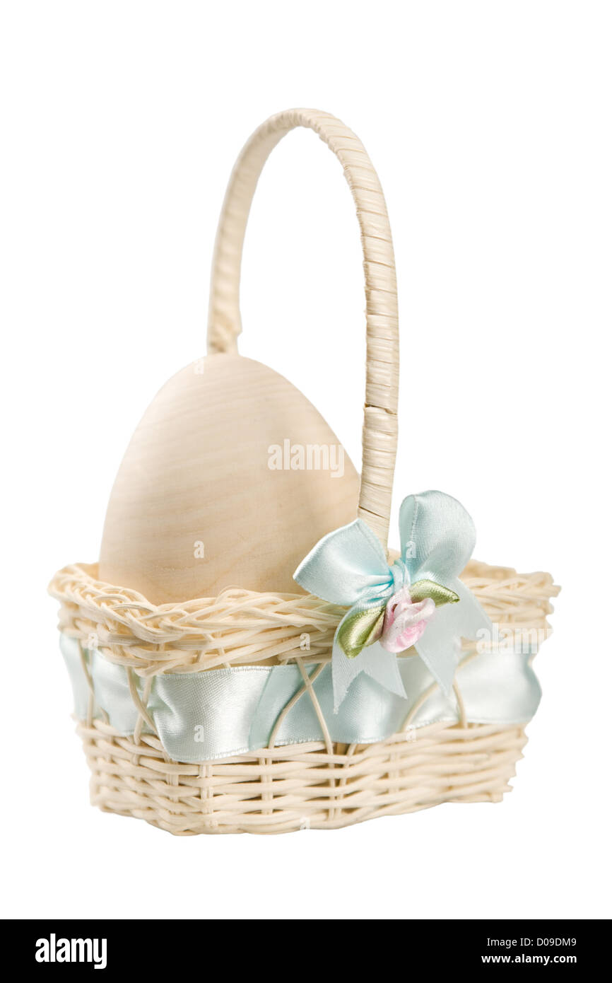 Pastel egg in Easter basket Stock Photo