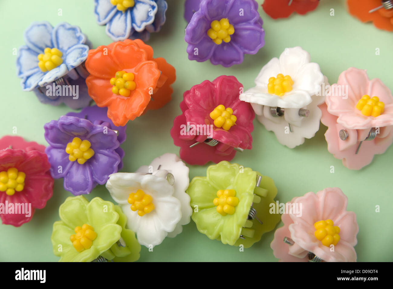 Group of multicolored kid floral hairpins Stock Photo