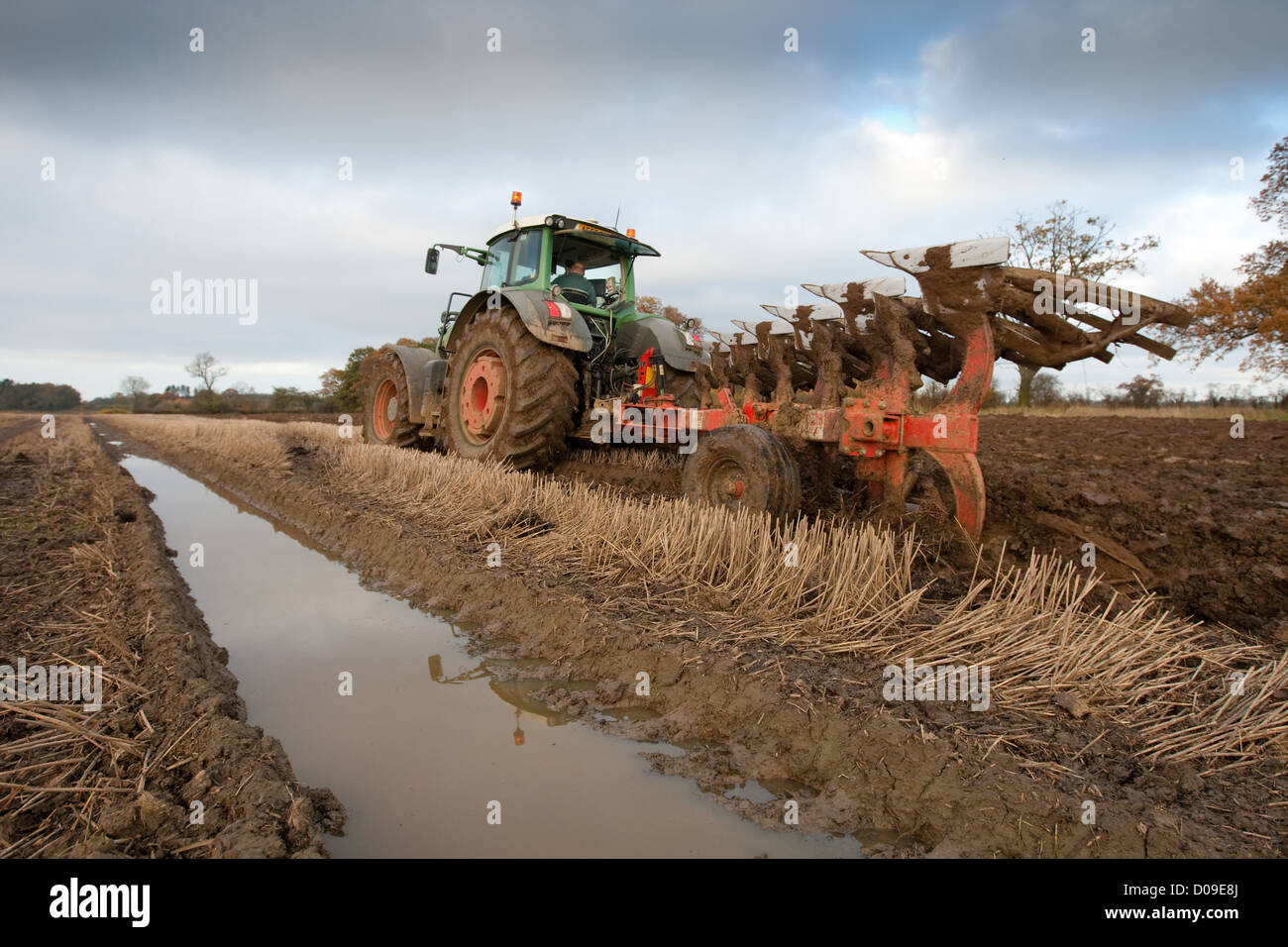 Fendt tractor ploughing wheat stubble in wet conditions Autumn 2012 Stock Photo