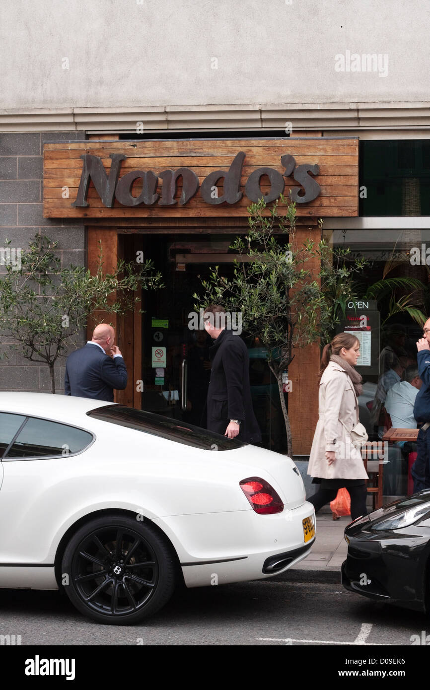 Entrance of Nando's, restaurant, on the high street. UK Stock Photo - Alamy