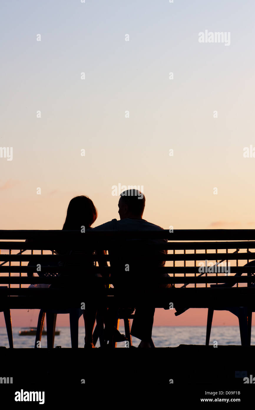 Romantic Couple at Sunset Stock Photo
