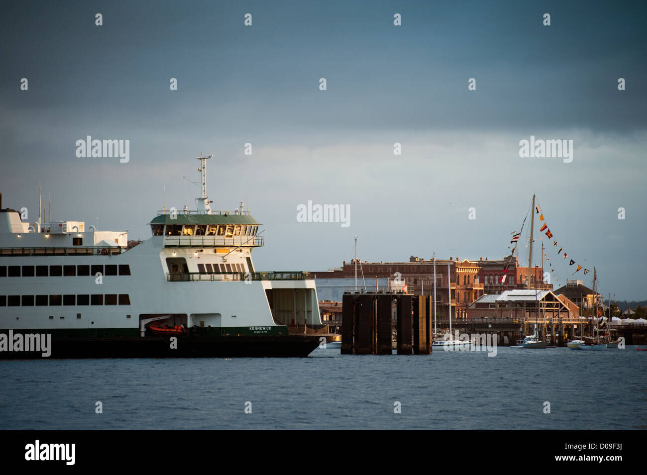 The historic victorian city of Port Townsend, Washington and the ferry that that serves the Olympic Peninsula from Keystone. Stock Photo