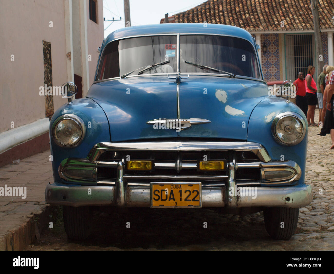 Blue classic 1950s American car in Trinidad Cuba parked in typical Cuban street Stock Photo