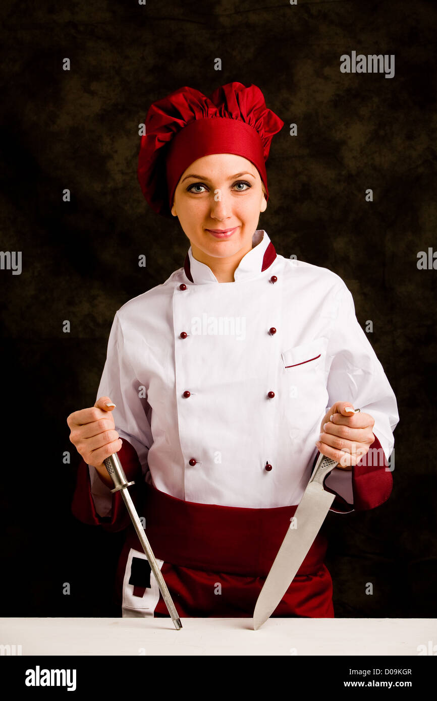 Chef Using Kinife Chef knife and sharpener hi-res stock photography and images - Alamy