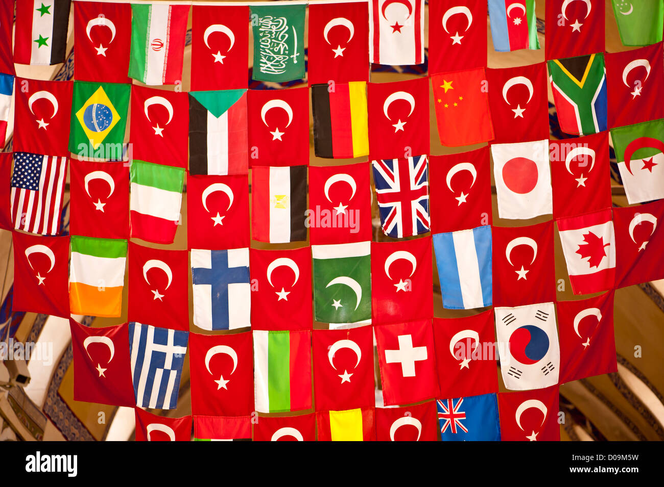 A display of many countries' flags in the Grand Bazaar, Istanbul. Stock Photo