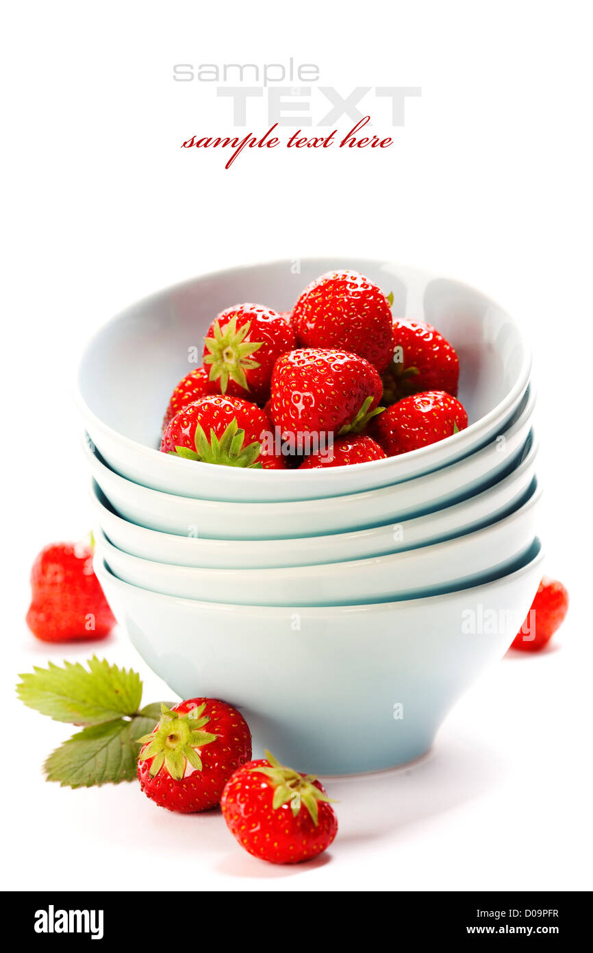 Fresh strawberries in bowl isolated on white background Stock Photo - Alamy