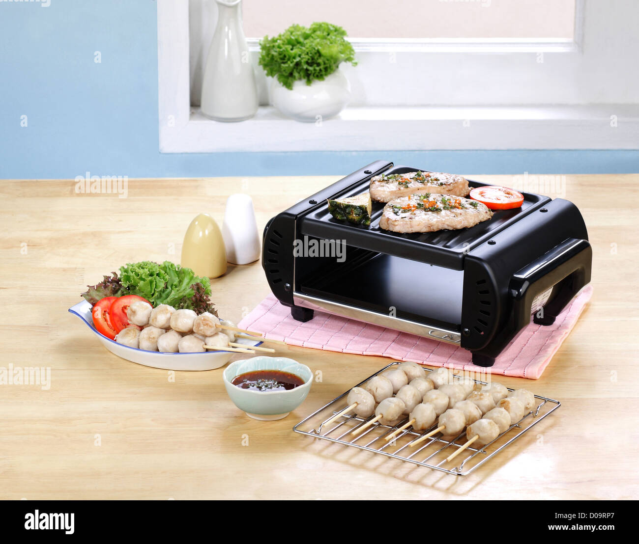 smokeless steak grill oven in the kitchen Stock Photo