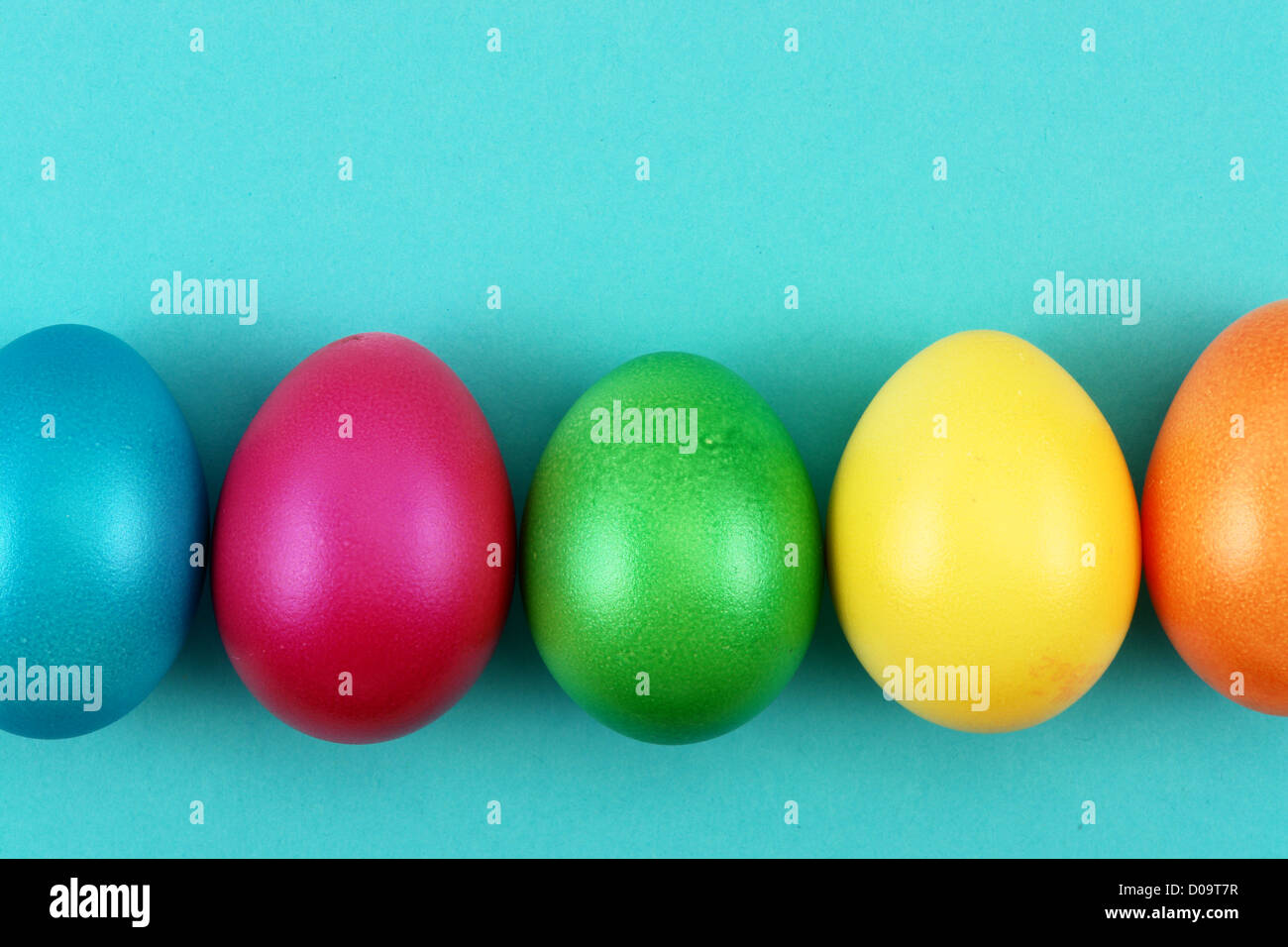 bright pastel colored easter eggs on  background Stock Photo