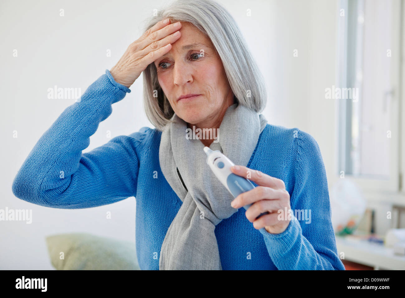 TEMPERATURE ELDERLY PERSON Stock Photo Alamy