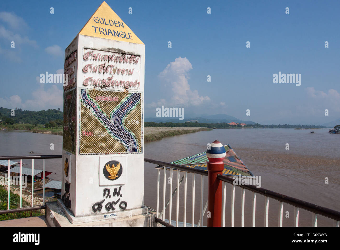 MONUMENT INDICATING GOLDEN TRIANGLE MAIN WORLD OPIUM-PRODUCING ZONE BEHIND IT MEKONG RIVER GOLDEN TRIANGLE VILLAGE SOP RUAK Stock Photo