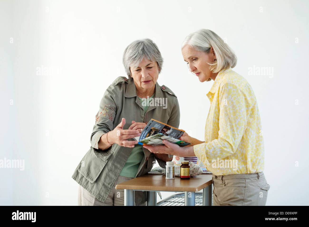 ELDERLY PERSON INDOORS Stock Photo