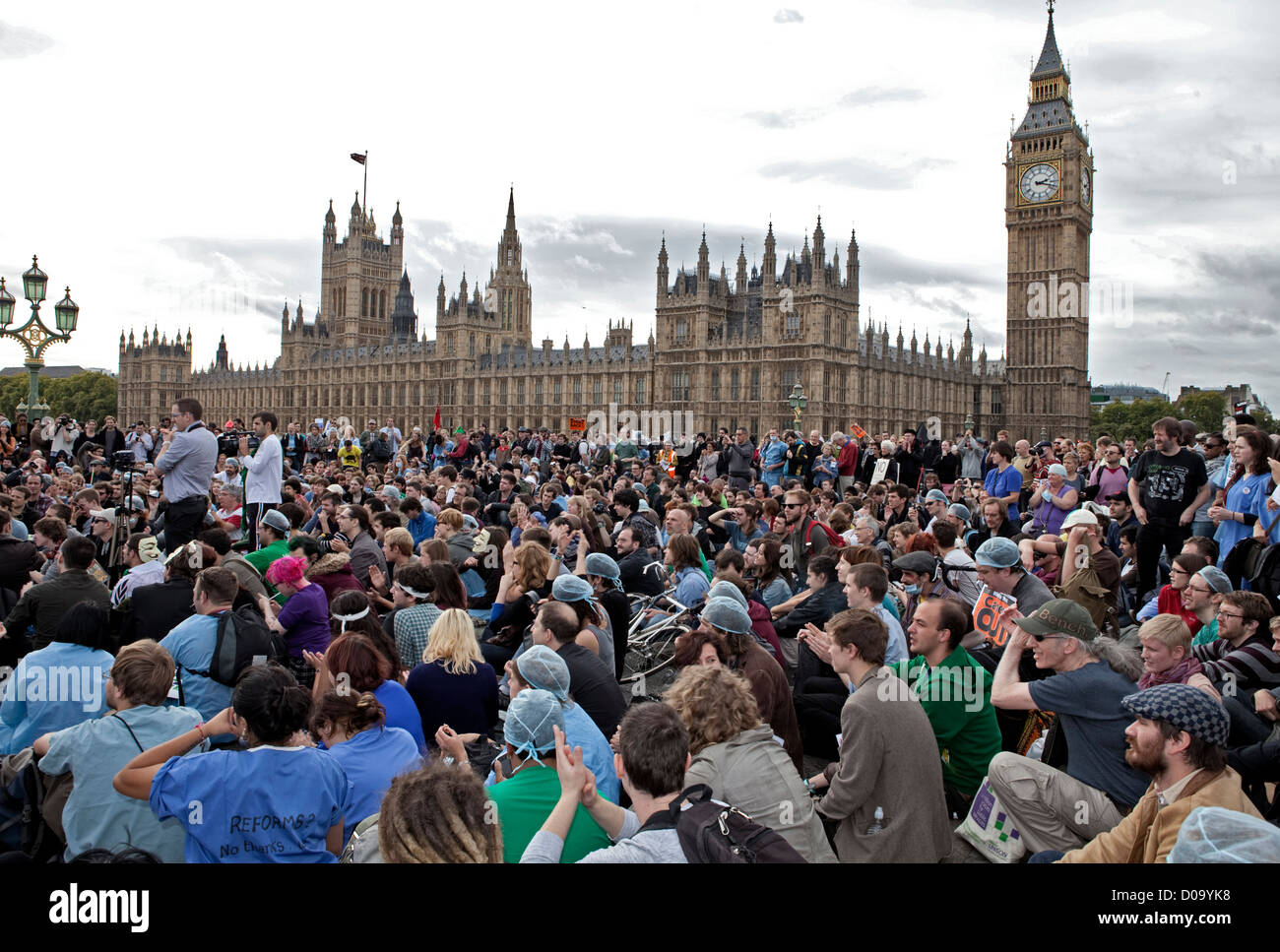 CROWDS GATHER ON westminster bridge during the UK UNCUT anti-cuts to NHS RALLY, OCTOBER 2011 Stock Photo