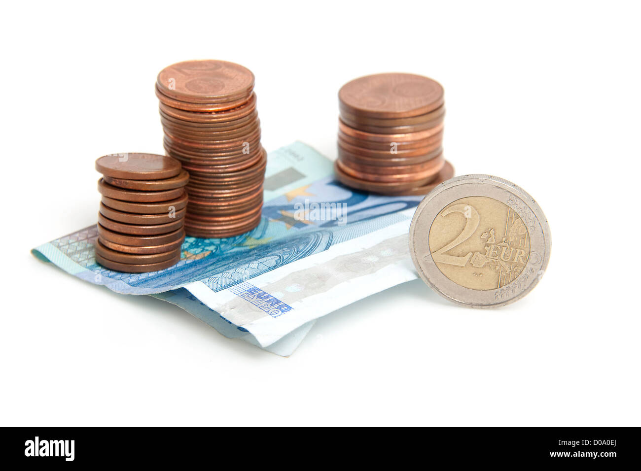 Euro money: stack of coins and paper over white background Stock Photo