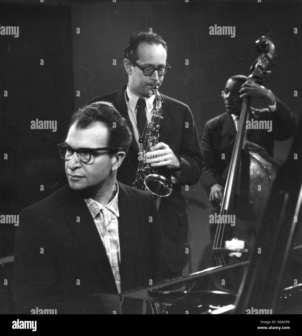 DAVE BRUBECK QUARTET  about 1965 with Paul Desmond on saxophone, Brubeck on piano and Eugene Wright on double bass Stock Photo