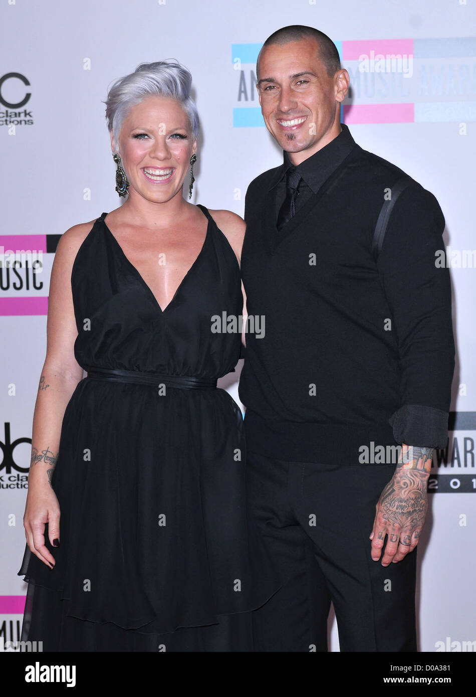 Singer Pink, real name Alecia Moore and husband Carey Hart 2010