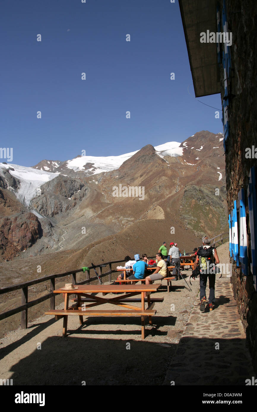 walkers at Rifugio Larcher al Cevedale, Trentino, Italy Stock Photo