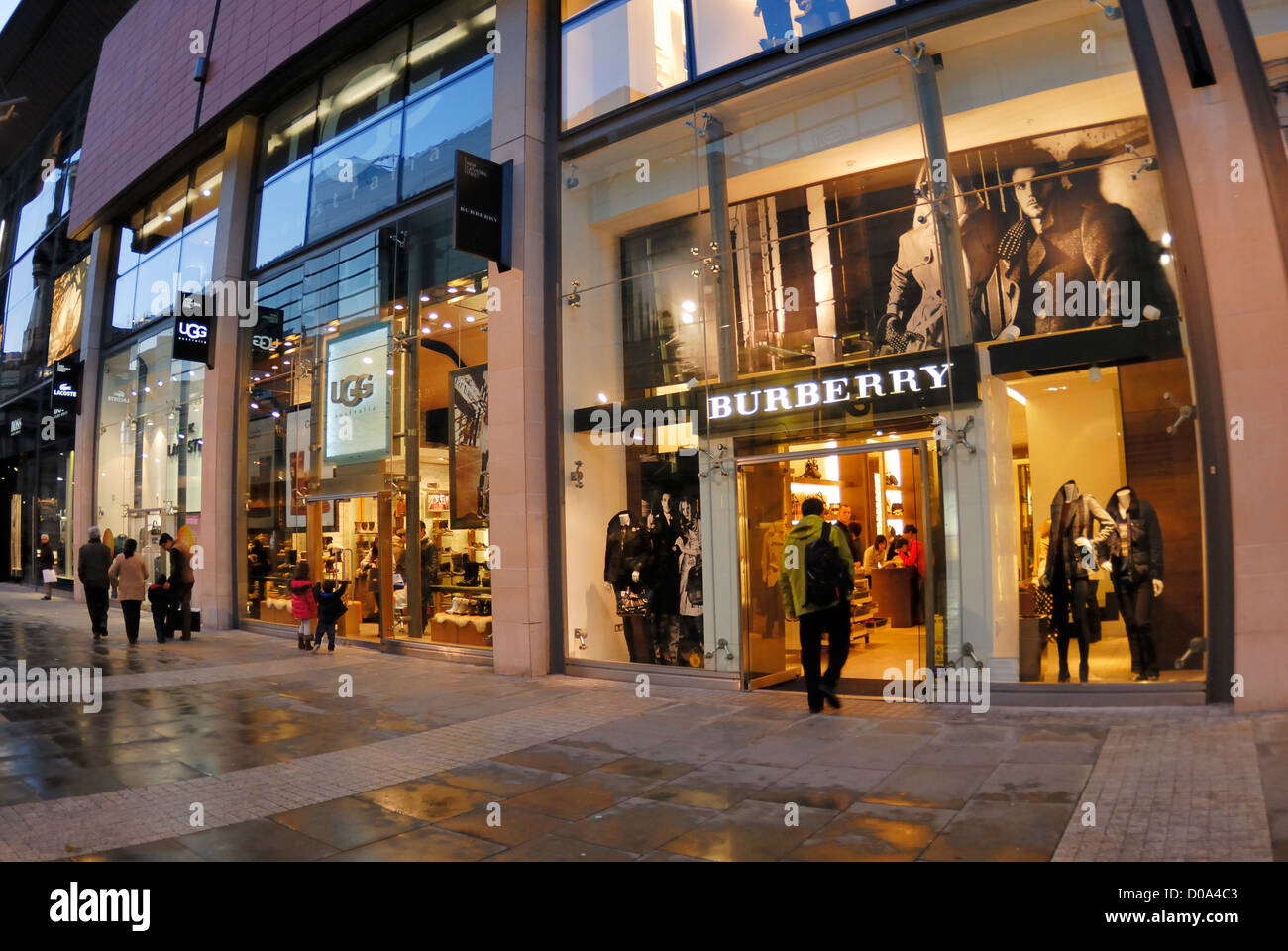 Burberry Store in Manchester illuminated in the evening Stock Photo - Alamy