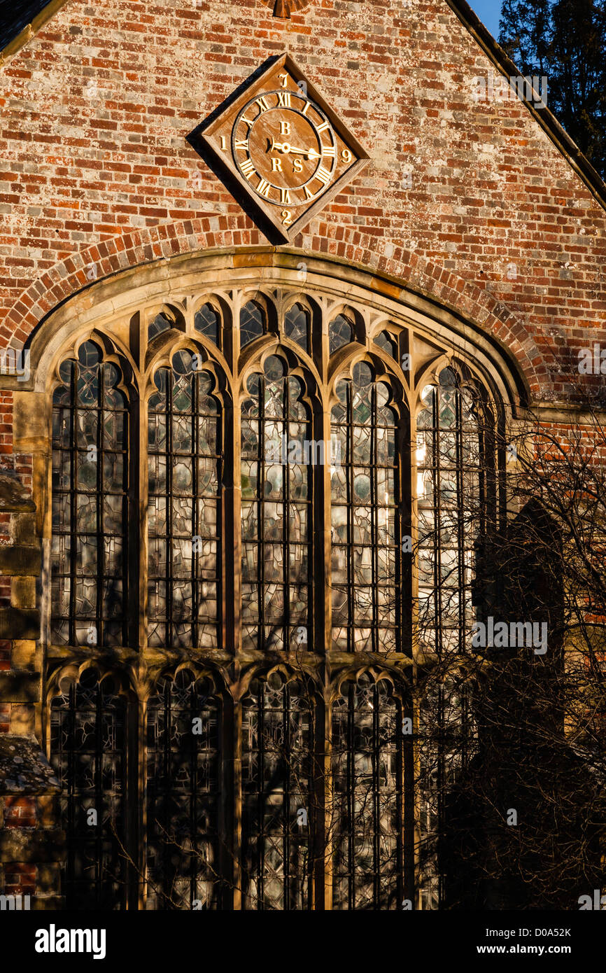 Pretty chapel with stained glass window and unusual clock in the pretty