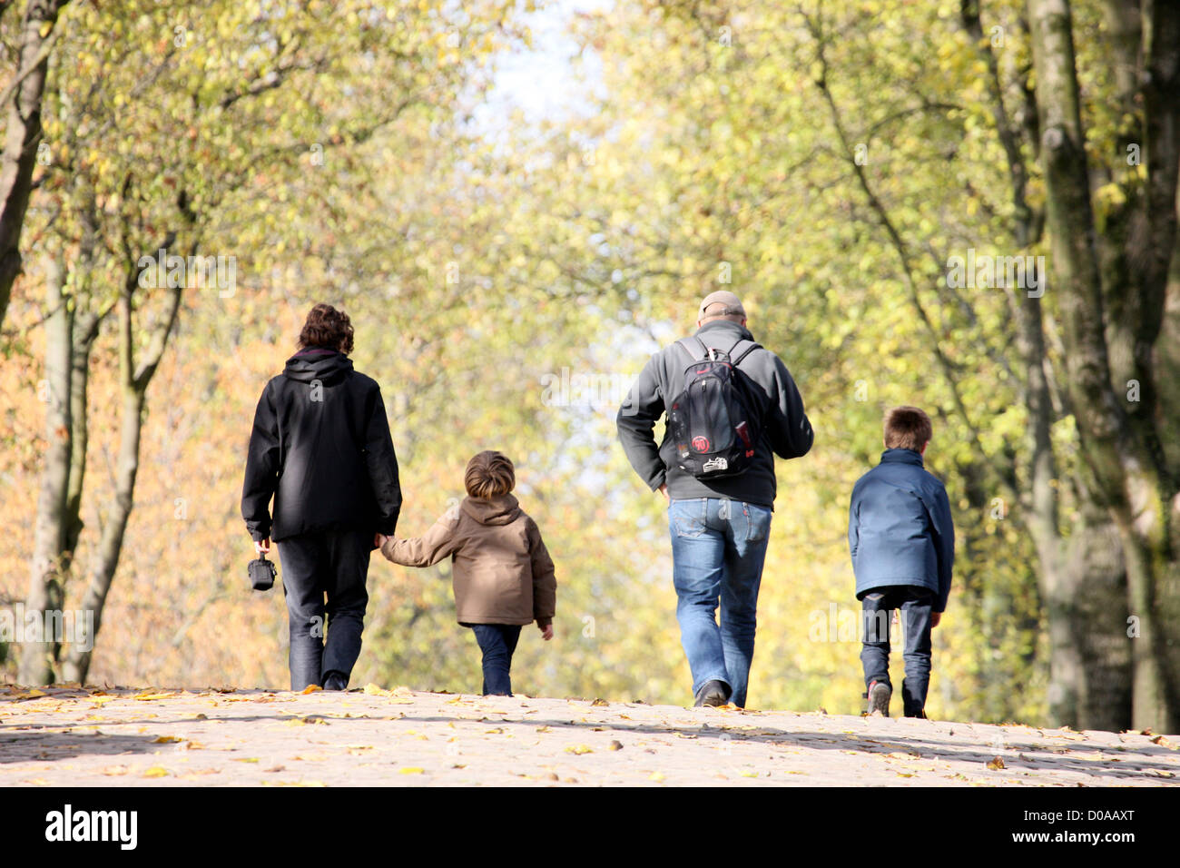 Rear view family mum dad hi-res stock photography and images - Alamy